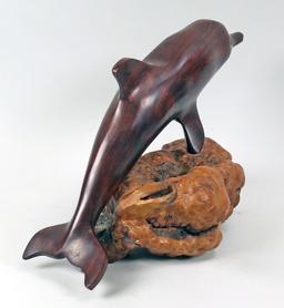 Hand Carved Ironwood Dolphin on a Wood Burl