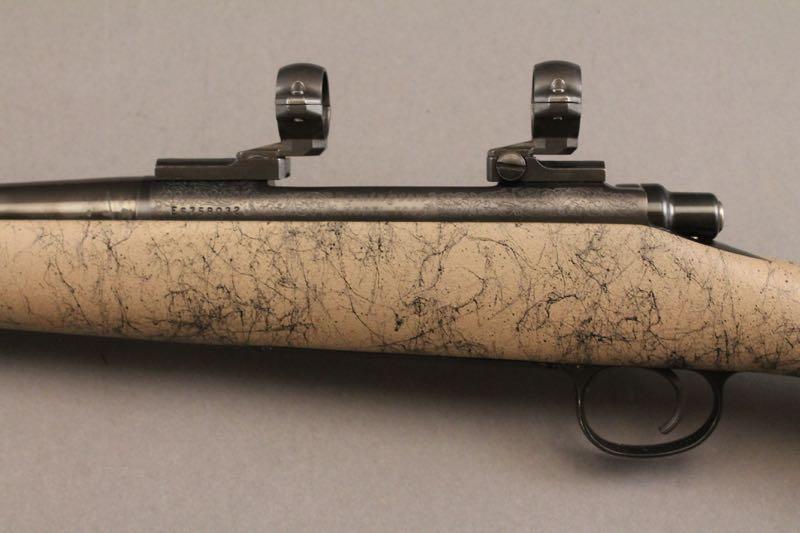 REMINGTON MODEL 700 DELUXE, BOLT ACTION 7MM MAG RIFLE