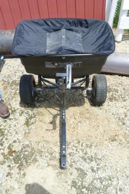 Agri-fab rubber tired lawn fertilizer cart.
