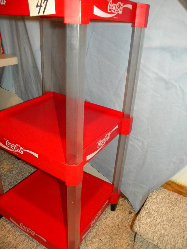 Coca Cola= Three Tier Plastic Organizer Stand.