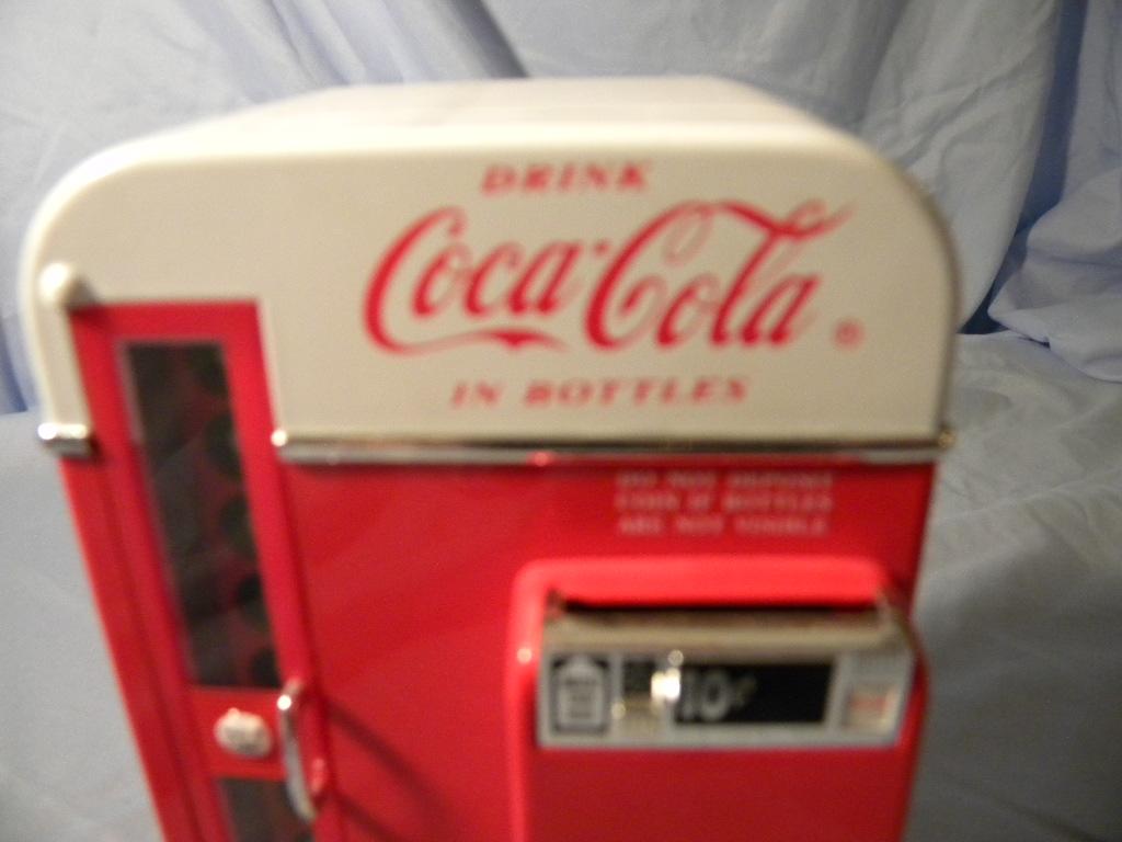 Coca Cola= Front Load Dispenser.