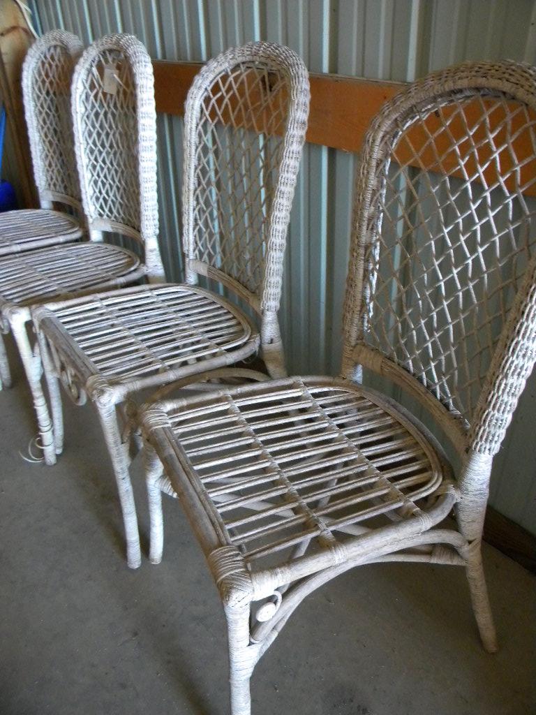 Four Wicker Dining Chairs.