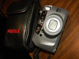 Bell And Howell 2123 El W/camera And Case; Pentax Ioz 35 Mm Camera W/case;