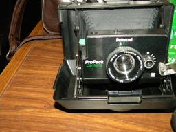 Bell And Howell 2123 El W/camera And Case; Pentax Ioz 35 Mm Camera W/case;