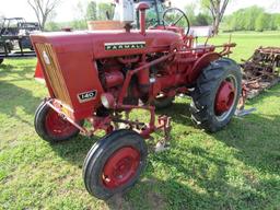Farmall 140 tractor w/disc, 2 pan turning plow,