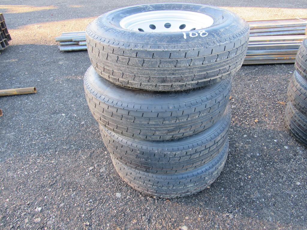 Lot of (4) Unused 235/80R16 tires & 8 hole rims