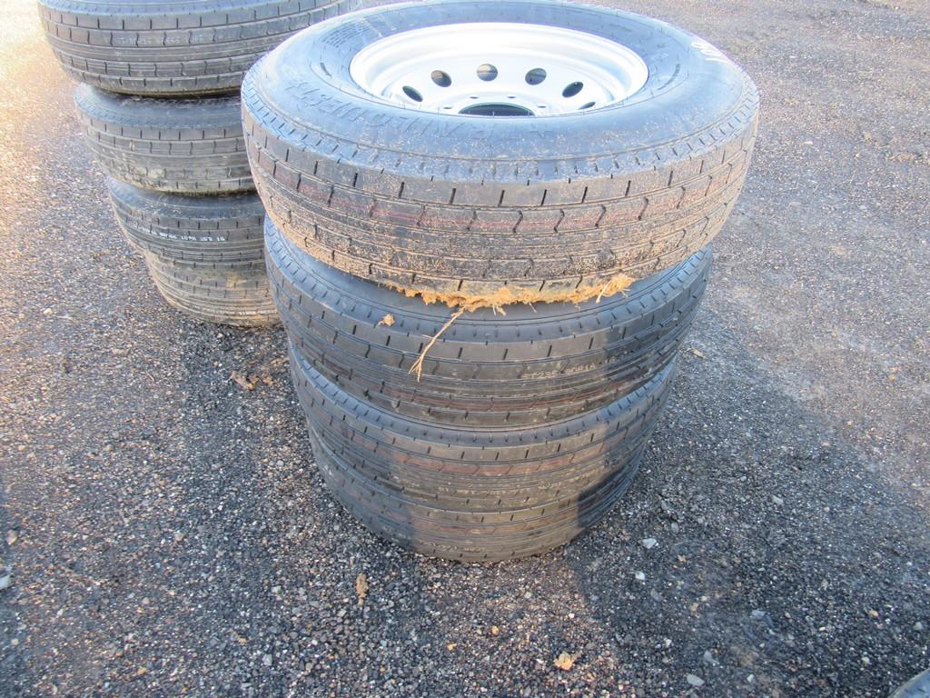 Lot of (4) Unused 235/80R16 tires & 8 hole rims