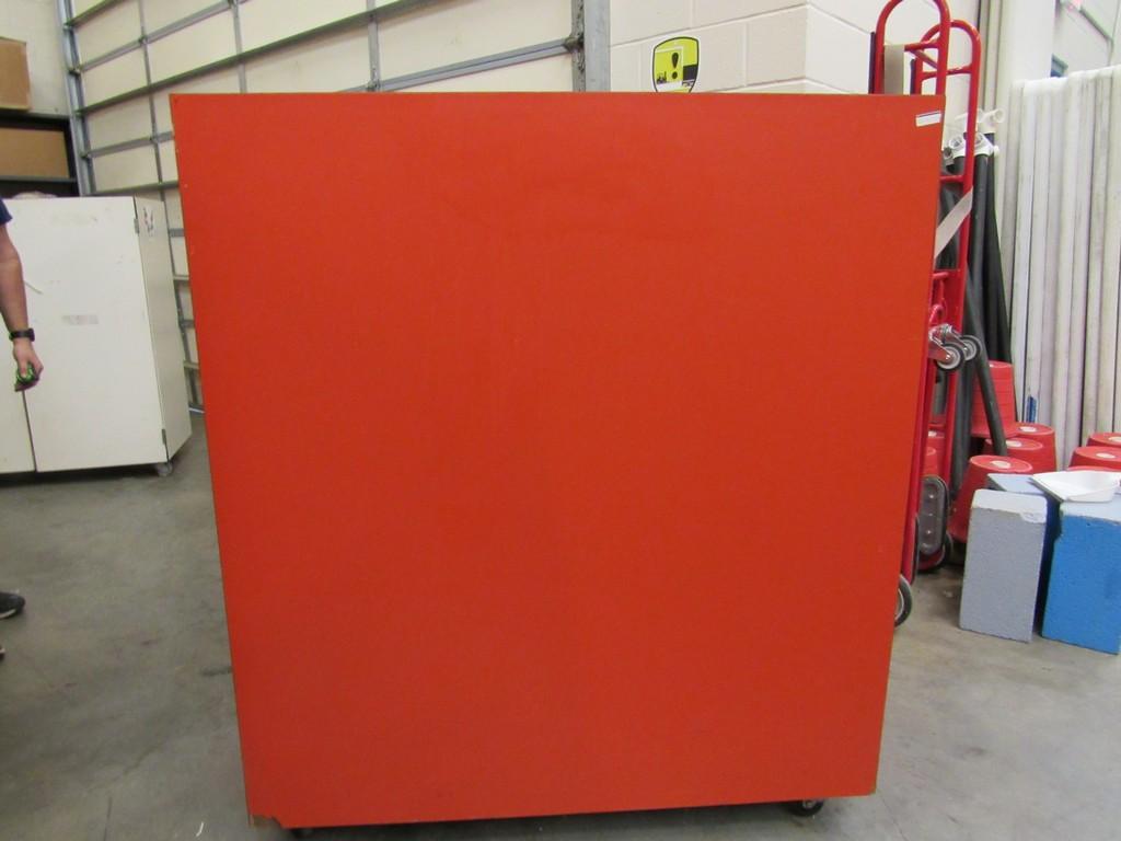 Red cabinet on casters w/rest mats