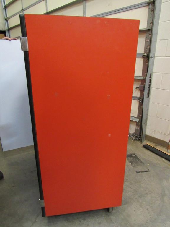 Red cabinet on casters w/rest mats