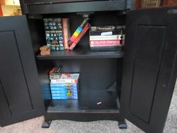 Black wooden secretary with contents