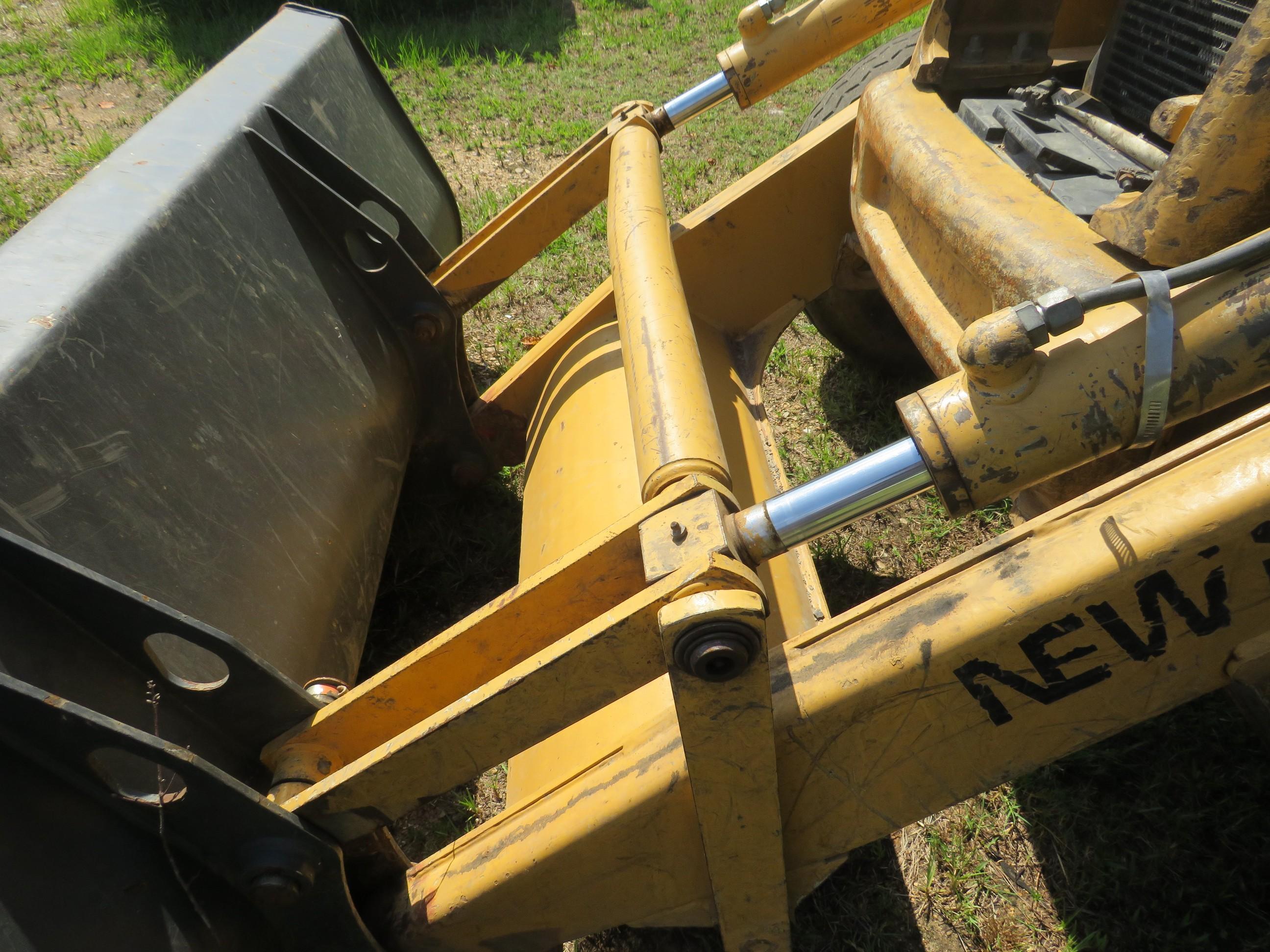 New Holland 555E Loader Backhoe