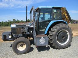 New Holland 7740 tractor w/Alamo side boom