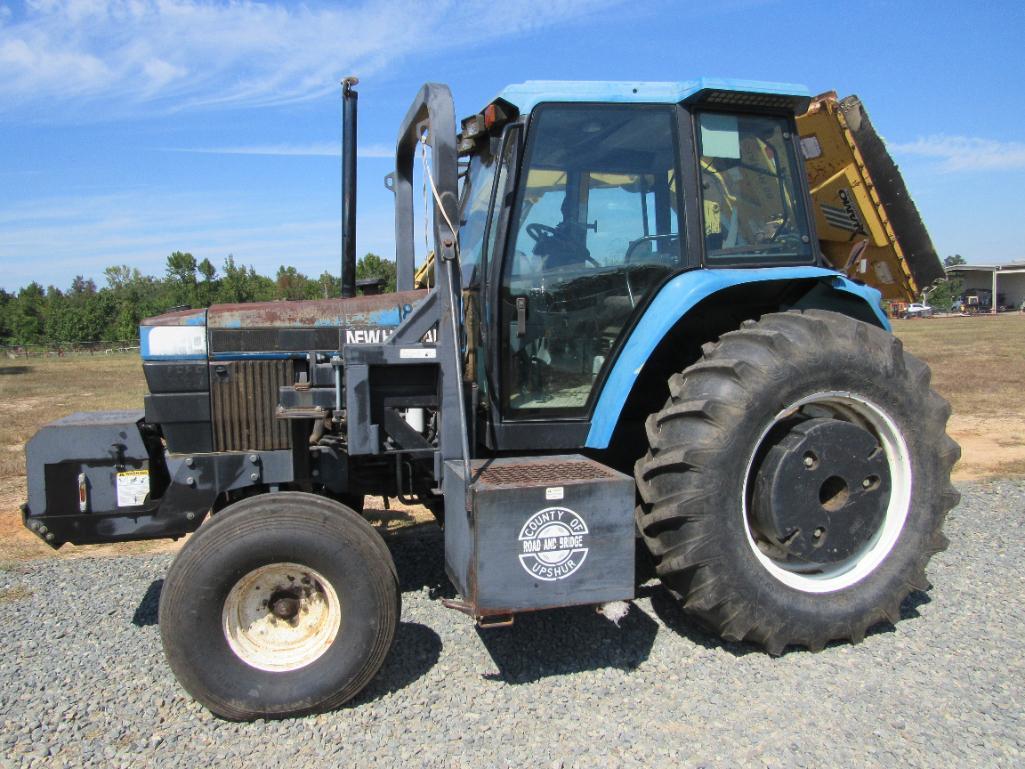 New Holland 7740 tractor w/Alamo side boom