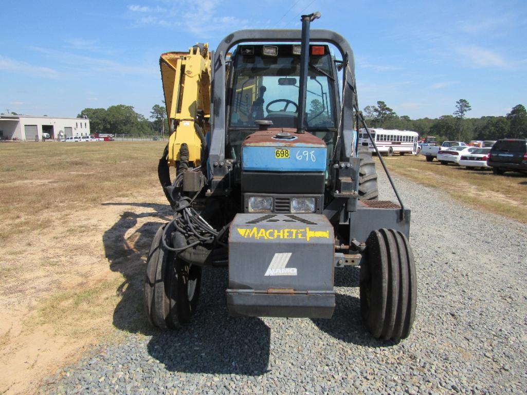 New Holland 7740 tractor w/Alamo side boom