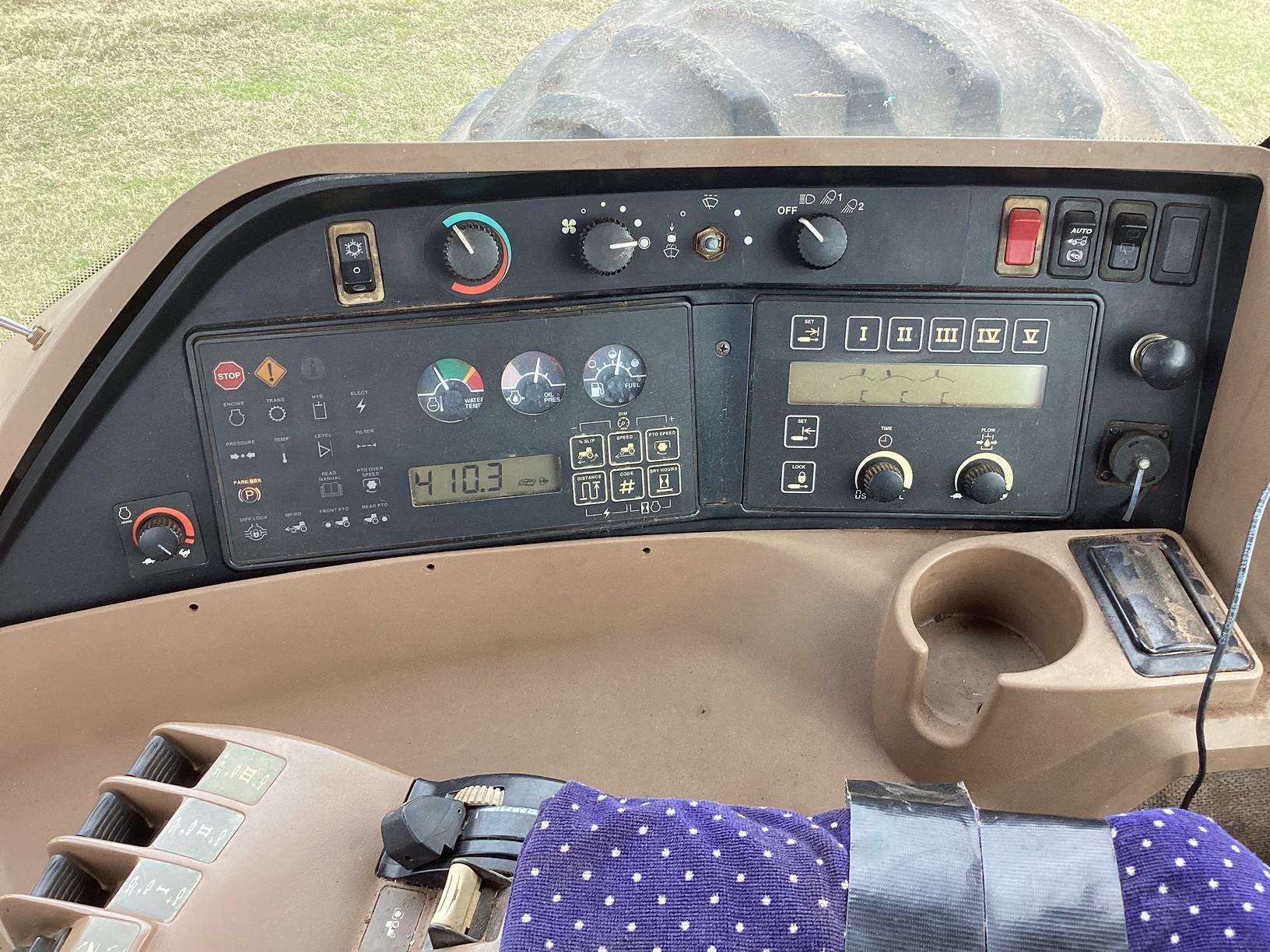 John Deere 8300 MFWD Tractor with front mount tank, 412 hours showing