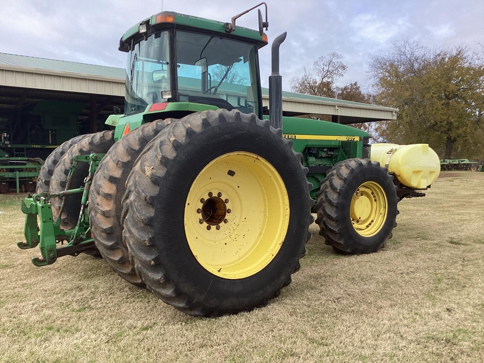 John Deere 8300 MFWD Tractor with front mount tank, 412 hours showing