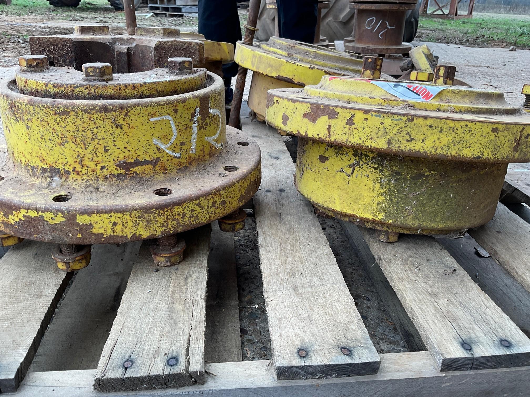 (2) John Deere dual hubs