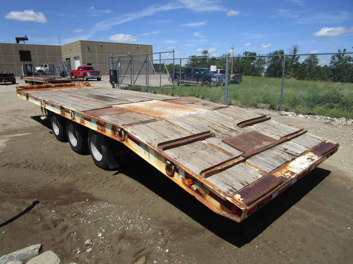 2005 Butler triple axle dully, 8' x 28' dove tail trailer, w/24' tilt bed, model# ETW 9400, new air 