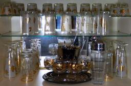 Large Collection of Mid Century Matching Drinking Glasses, Shaker and Ice Bucket