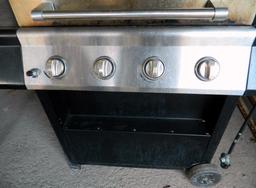 Two GrillMaster 4-Burner Propane Stainless Gas Grills with Side Burners