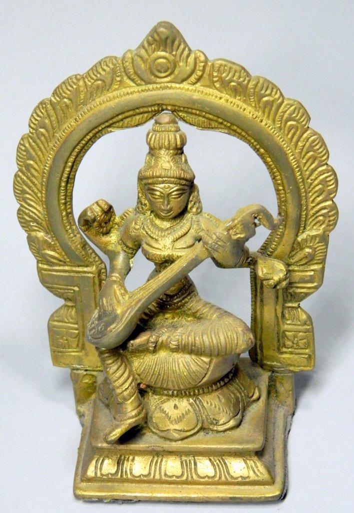 Goddess Saraswati Playing Veena with Floral Aureole