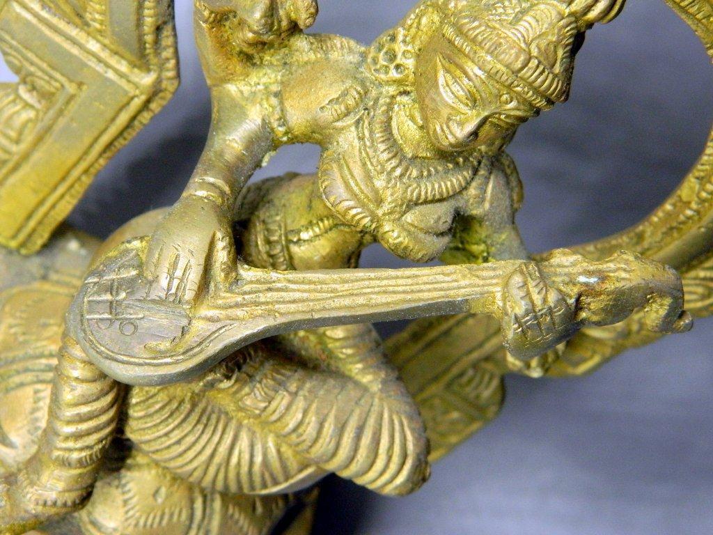 Goddess Saraswati Playing Veena with Floral Aureole