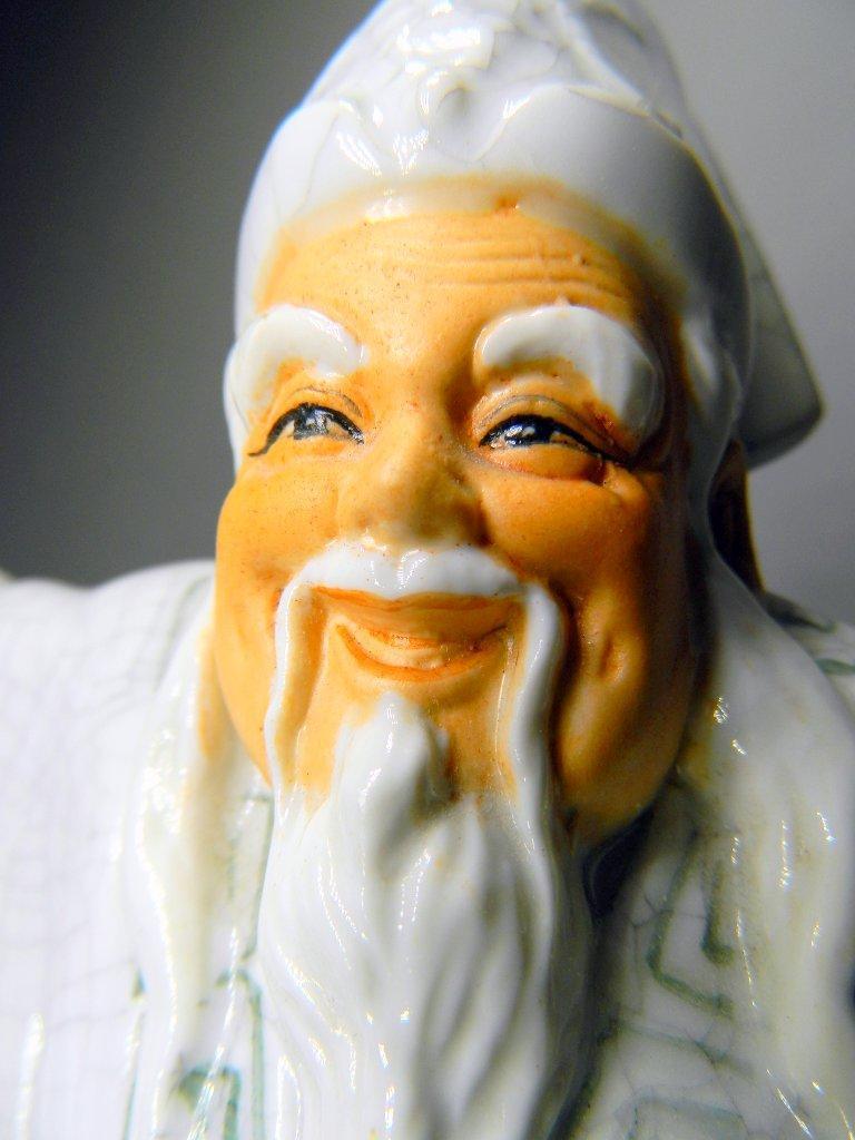 Chinese God of Wisdom, Smiling Porcelain Sage With Scroll Figure