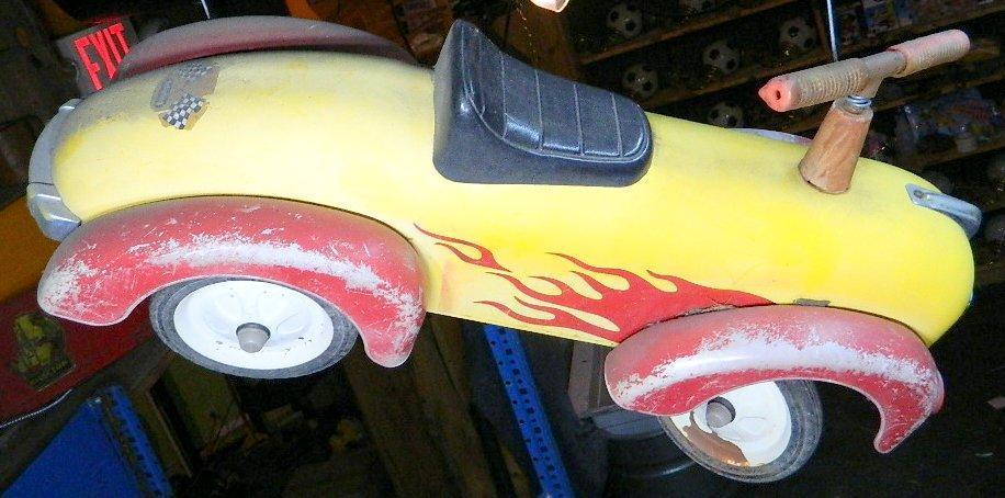 Older Ride-on Toy Car with Flames