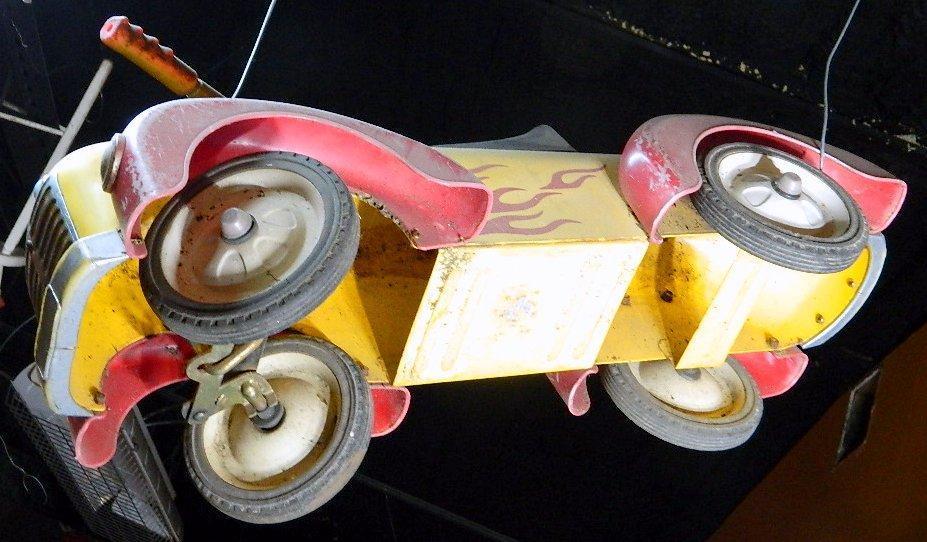 Older Ride-on Toy Car with Flames