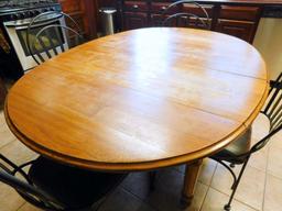 Wooden Dining Table with Four Black Metal Chairs