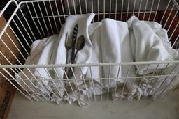 Wrapped plain pattern silverware with Linen napkins