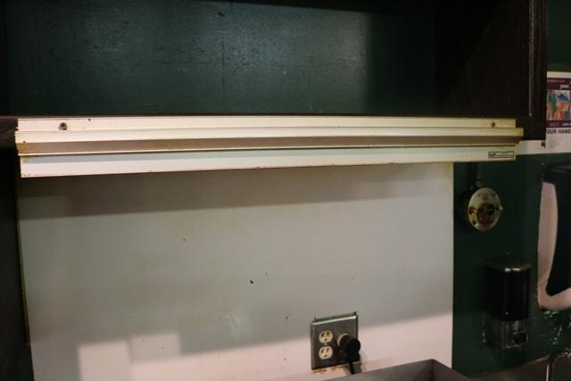 Times 2 - 30" & 44" ticket rails with oak wall mount cabinet