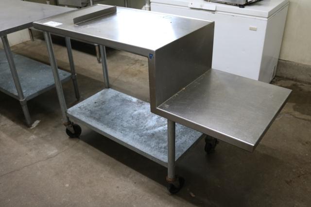 Portable stainless 23" x 40" table with right hand 20" x 23" equipment stan