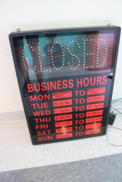 Lighted OPEN sign with hour display