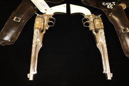 Pair to go -  Hubley Colt 45 cap guns with holsters