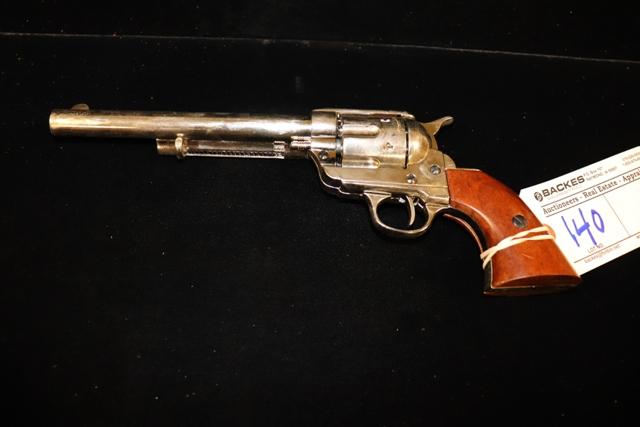 Colt 45 brown grip cap gun with holster