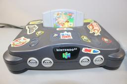 Nintendo 64 game console w/ 13 assorted games & hand controller