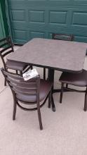 36" x 36" Laminate top dining table with 4 padded chairs - nice set