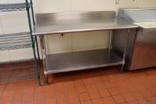 30" x 60" Stainless table with stainless under shelf & 5" back splash