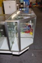 20" x 20" x 38" tall lighted glass corner display cabinet