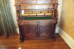 Walnut cylinder roll parlor secretary