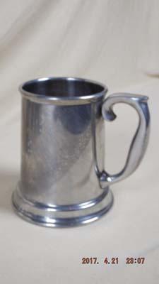 Five pewter tankards with glass bottoms