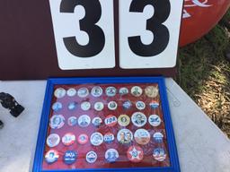 Group of Presidential buttons in a plastic frame; 38 total buttons