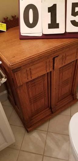 Liquor Cabinet/Bar made from vintage sewing machine cabinet; oak; top lifts for storage plus cabinet