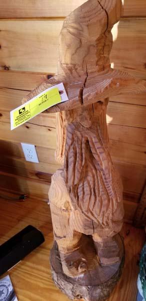 Saw Carved Mountaineer on Log, Plus Basket with Large Pine Cones
