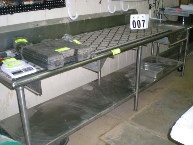 Stainless table 9'9"l x 28"d, 7'10" backsplash, 34" t bottom shelf false drawer