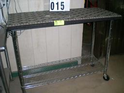 Stainless table on casters; 50"l x 24"d x 39"t