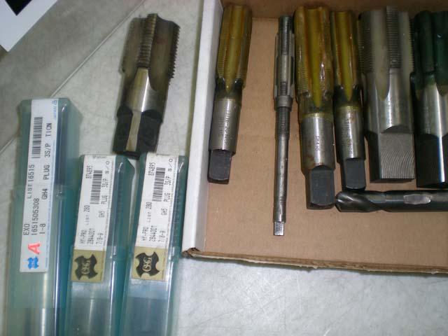 Box with 10 misc. taps &1drill bit