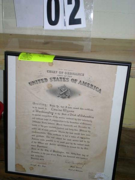 Framed "The Chief of Ordinance, Army of the USA”, award to Louise Wynne recorded 423, dated 1-19-43