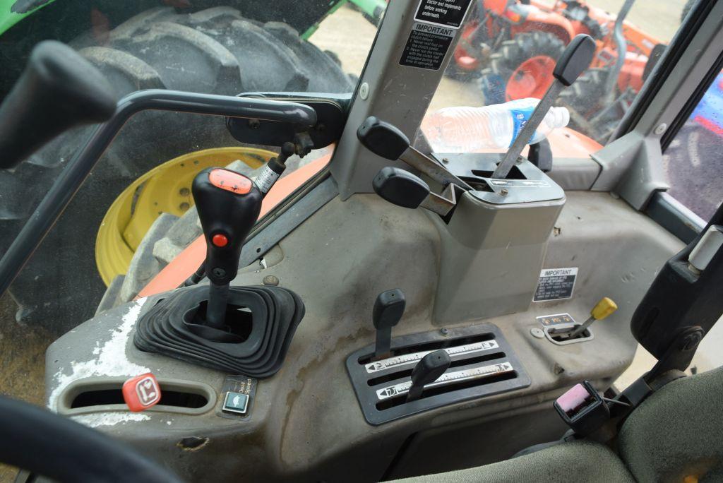 KUBOTA M105S 4WD C/A W/ LDR AND HAY FORK
